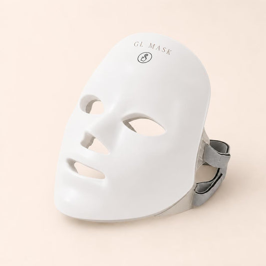 Mascarilla LED GL MASK sobre fondo crema